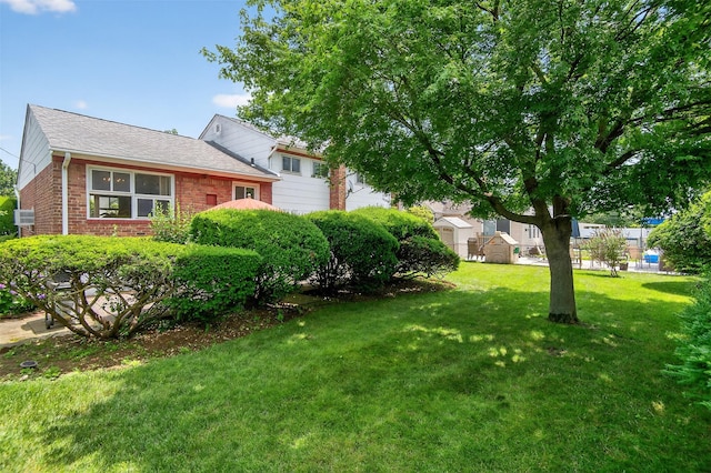 5 Clark St, Plainview, NY 11803 - view of green lawn featuring cooling unit