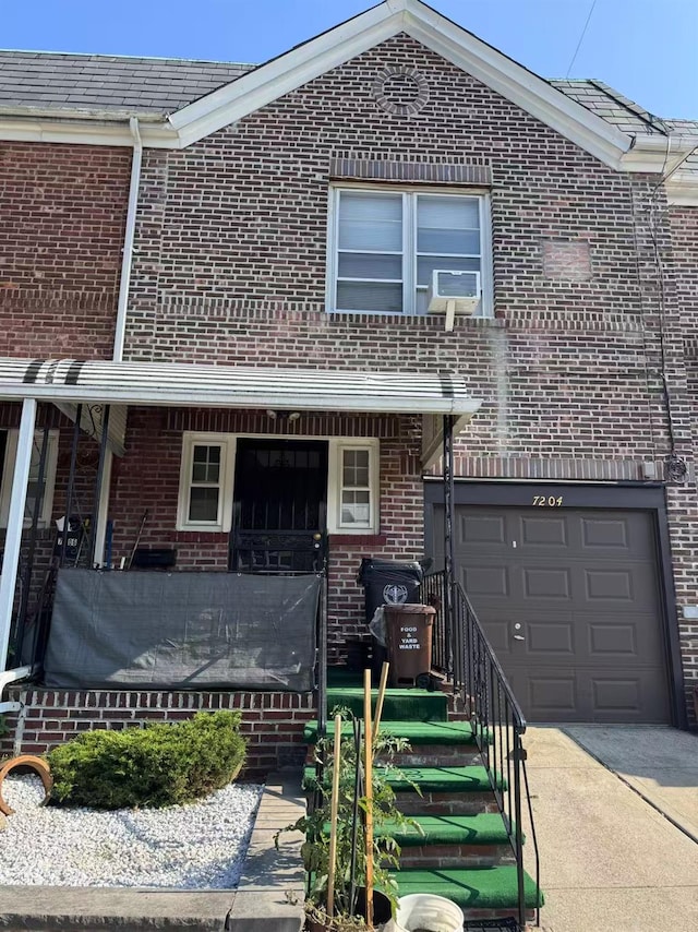 7204 Calamus Ave, Woodside, NY 11377 - traditional-style home with brick siding, driveway, cooling unit, and a garage