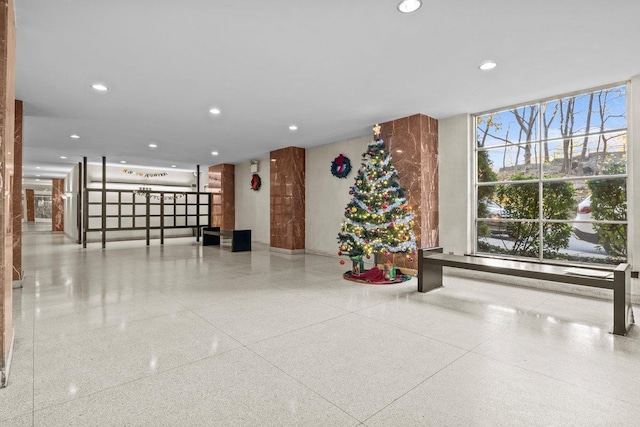 5500 Fieldston Rd Unit 5Cc, Bronx, NY 10471 - lobby with recessed lighting and a wall of windows