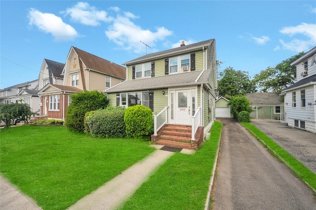 73 Bismark Ave, Valley Stream, NY 11581 - view of front of house featuring entry steps, a chimney, a front lawn, and a garage