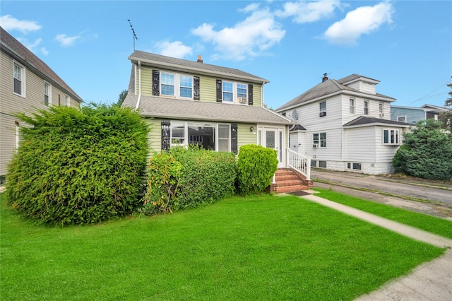73 Bismark Ave, Valley Stream, NY 11581 - view of front of home featuring a front yard