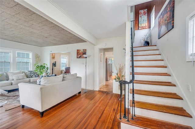73 Bismark Ave, Valley Stream, NY 11581 - living area featuring hardwood / wood-style flooring and stairs