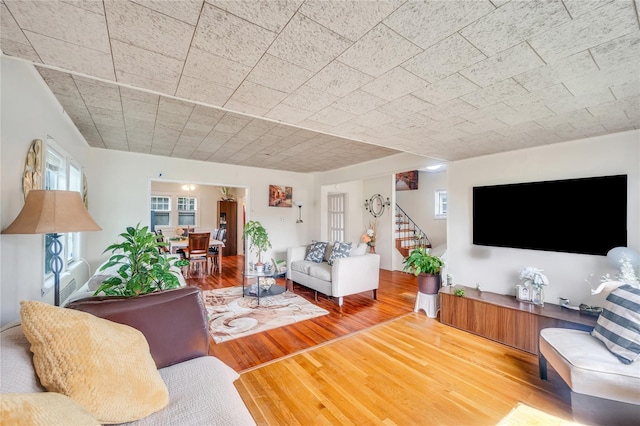 73 Bismark Ave, Valley Stream, NY 11581 - living room with wood finished floors and stairway