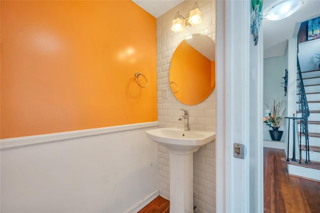 73 Bismark Ave, Valley Stream, NY 11581 - bathroom featuring wood finished floors and a sink