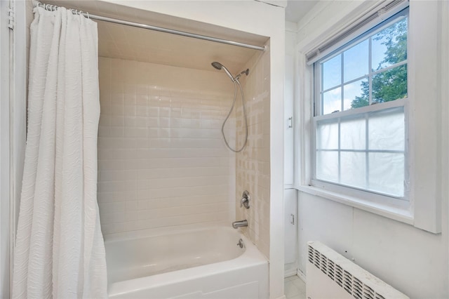 73 Bismark Ave, Valley Stream, NY 11581 - full bathroom with shower / bathtub combination with curtain and radiator