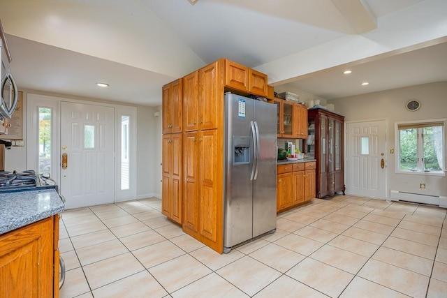 23 Sky Meadow Rd, Suffern, NY 10901 - kitchen featuring appliances with stainless steel finishes, light tile patterned floors, brown cabinetry, recessed lighting, and glass insert cabinets