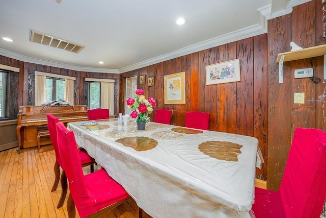 23 Sky Meadow Rd, Suffern, NY 10901 - dining room featuring ornamental molding, hardwood / wood-style flooring, wood walls, and recessed lighting