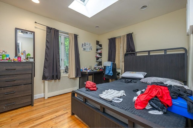 23 Sky Meadow Rd, Suffern, NY 10901 - home office featuring a skylight, wood finished floors, radiator, and recessed lighting