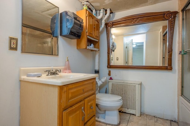 23 Sky Meadow Rd, Suffern, NY 10901 - bathroom with radiator heating unit, vanity, tile patterned floors, and an enclosed shower