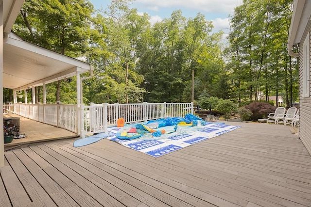 23 Sky Meadow Rd, Suffern, NY 10901 - wooden terrace featuring view of scattered trees