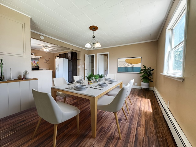 246 15th St, West Babylon, NY 11704 - dining space with a baseboard radiator, crown molding, wood finished floors, and a chandelier
