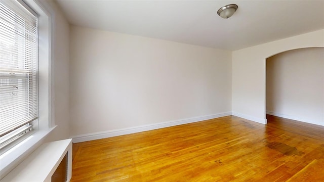 151 Prospect Unit 3-F, Mount Vernon, NY 10550 - spare room featuring arched walkways and light wood-style floors