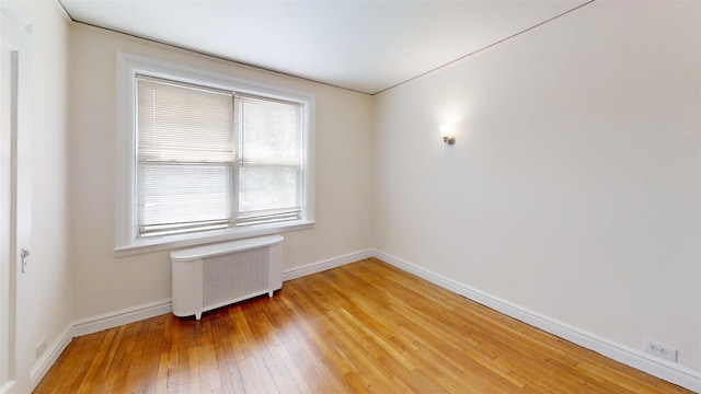 151 Prospect Unit 3-F, Mount Vernon, NY 10550 - empty room with radiator heating unit and light wood finished floors