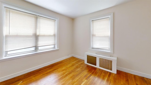 151 Prospect Unit 3-F, Mount Vernon, NY 10550 - spare room with radiator, plenty of natural light, and light wood-style floors