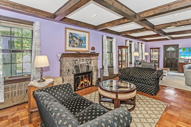 25 Reyam Rd, Lynbrook, NY 11563 - living area with coffered ceiling, beam ceiling, and a fireplace