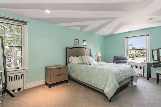 25 Reyam Rd, Lynbrook, NY 11563 - bedroom with radiator, multiple windows, light colored carpet, and recessed lighting