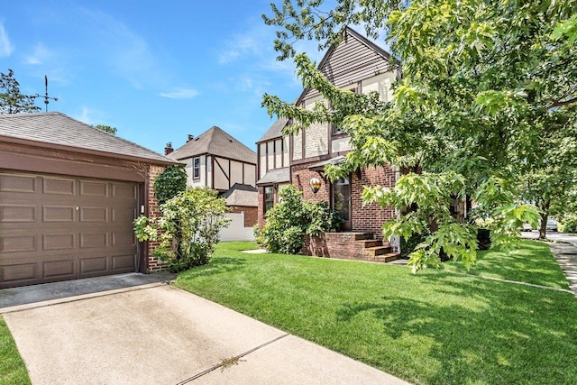 25 Reyam Rd, Lynbrook, NY 11563 - view of grassy yard featuring a garage and concrete driveway