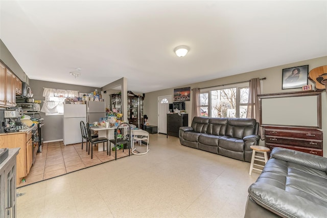 1002 Park Ave, Westbury, NY 11590 - living area featuring healthy amount of natural light