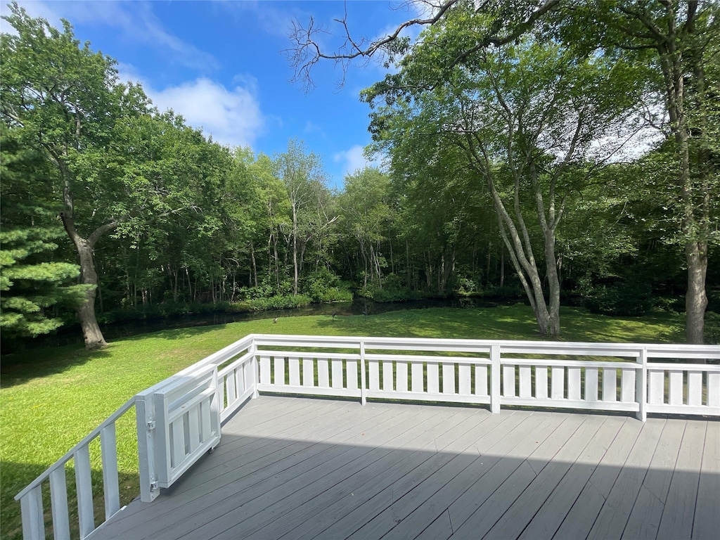 8 Trezza Ct, Bellmore, NY 11710 - wooden deck with a lawn