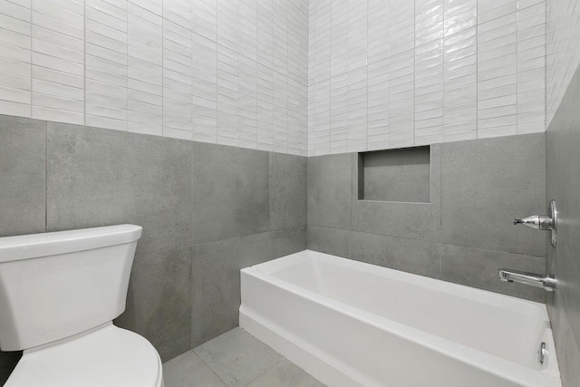5 Francis Pl Unit 214, Monsey, NY 10952 - full bathroom featuring tile walls, a tub, and tile patterned flooring