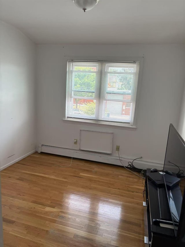 20-45 120th St, College Point, NY 11356 - spare room featuring light wood-type flooring