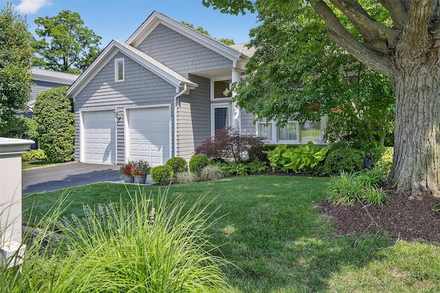 48 Fieldstone Ln, Oyster Bay, NY 11771 - view of front of home with driveway, a garage, and a front lawn