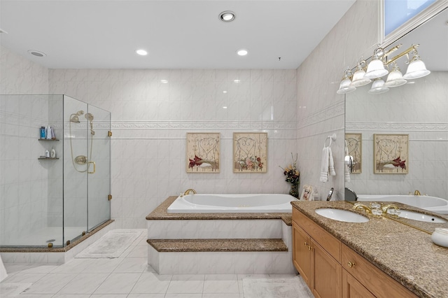 48 Fieldstone Ln, Oyster Bay, NY 11771 - full bath featuring a garden tub, a stall shower, tile walls, vanity, and tile patterned floors