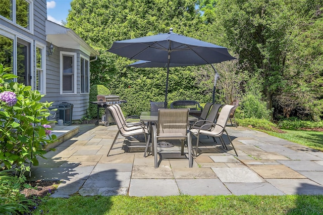 48 Fieldstone Ln, Oyster Bay, NY 11771 - view of patio / terrace featuring a grill and outdoor dining area