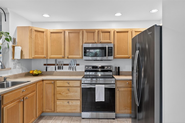 36 Bush Creek Ln, Poughquag, NY 12570 - kitchen with stainless steel appliances, light countertops, light tile patterned flooring, and recessed lighting