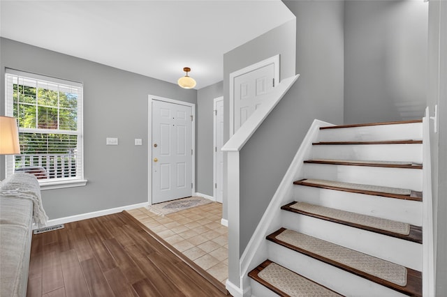 36 Bush Creek Ln, Poughquag, NY 12570 - foyer entrance featuring stairs and wood finished floors