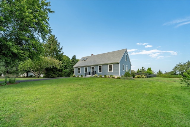 1030 Horseshoe Dr, Cutchogue, NY 11935 - view of front facade featuring a front lawn