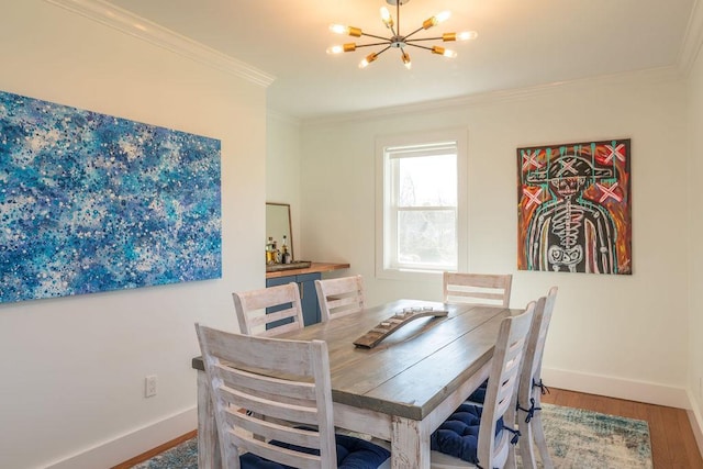 1030 Horseshoe Dr, Cutchogue, NY 11935 - dining space featuring a chandelier, wood finished floors, and ornamental molding
