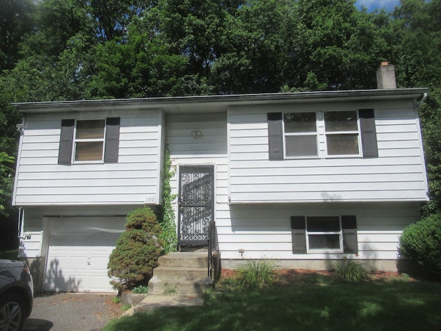 109 Indian Trl, Montgomery, NY 12543 - raised ranch with a garage and a chimney