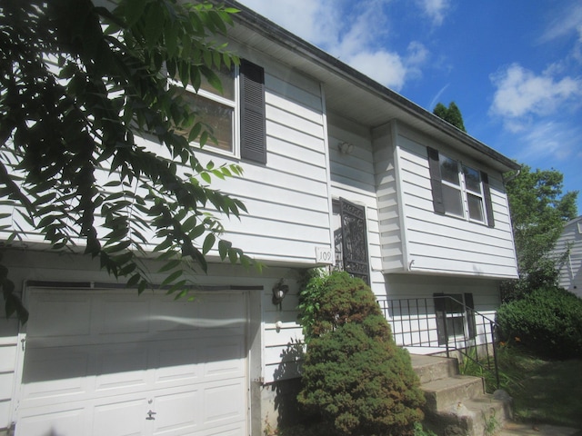 109 Indian Trl, Montgomery, NY 12543 - view of side of property with a garage