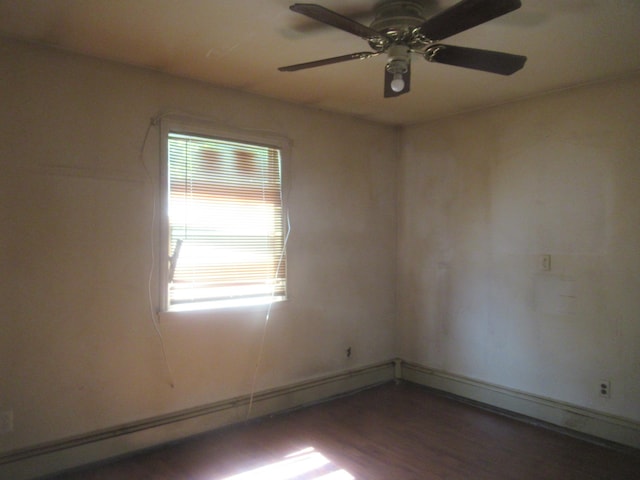 109 Indian Trl, Montgomery, NY 12543 - empty room with ceiling fan, wood finished floors, and baseboard heating