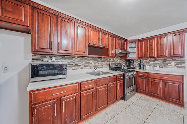 1285A Saint Marks Ave, Brooklyn, NY 11213 - kitchen with appliances with stainless steel finishes, light countertops, backsplash, and light tile patterned floors