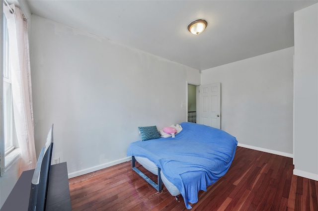 1285A Saint Marks Ave, Brooklyn, NY 11213 - bedroom with baseboards and wood finished floors