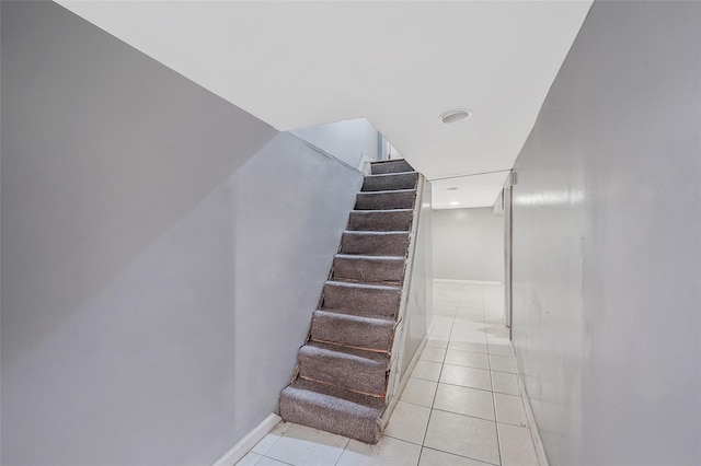 1285A Saint Marks Ave, Brooklyn, NY 11213 - staircase featuring tile patterned floors and baseboards