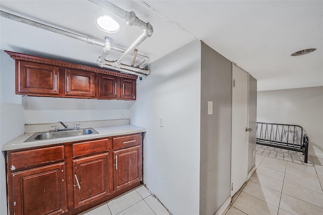 1285A Saint Marks Ave, Brooklyn, NY 11213 - kitchen with light tile patterned flooring, light countertops, and freestanding refrigerator