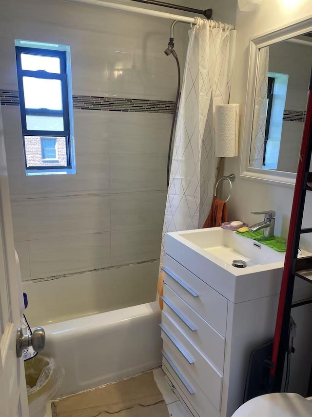 67-12 197th St Apt 1, Fresh Meadows, NY 11365 - bathroom featuring shower / bath combo and vanity