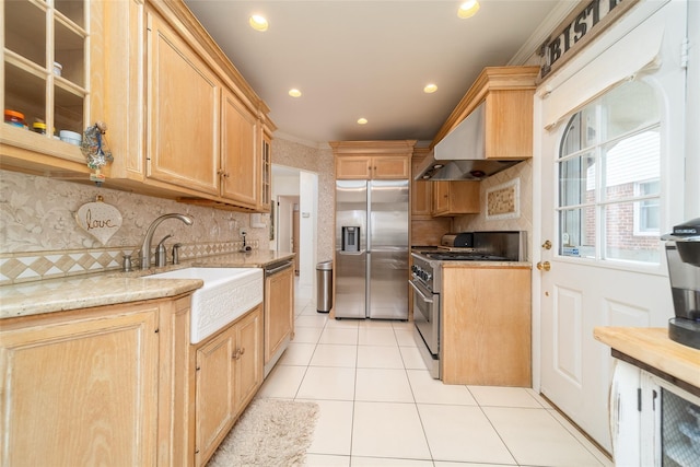 145-67 5th Ave, Whitestone, NY 11357 - kitchen featuring stainless steel appliances, light brown cabinets, wall chimney exhaust hood, light tile patterned floors, and tasteful backsplash