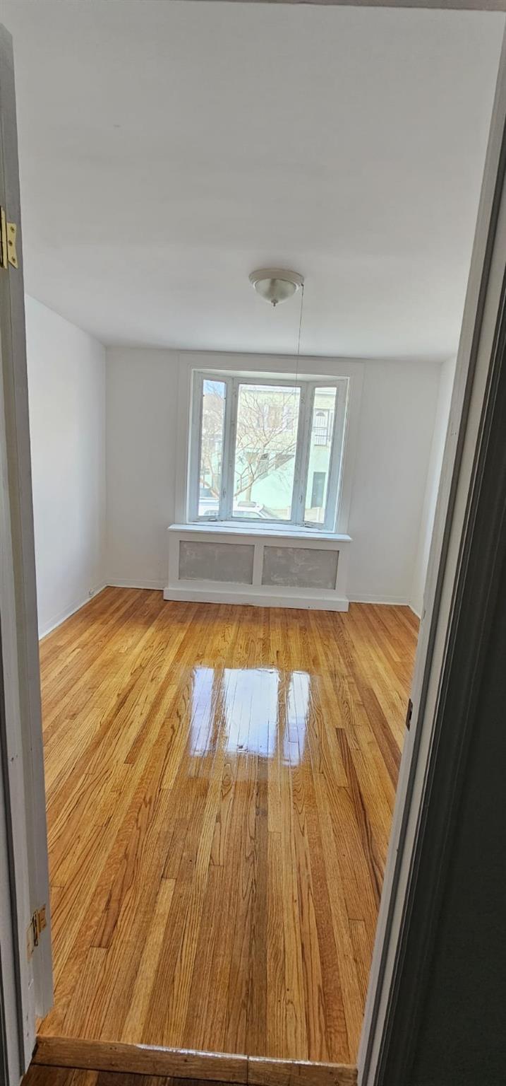 1468 Saint Lawrence Ave, Bronx, NY 10460 - unfurnished room with light wood-type flooring