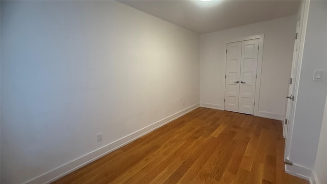142-20 Franklin Ave Unit 3V, Flushing, NY 11355 - unfurnished room featuring light wood-style floors and baseboards