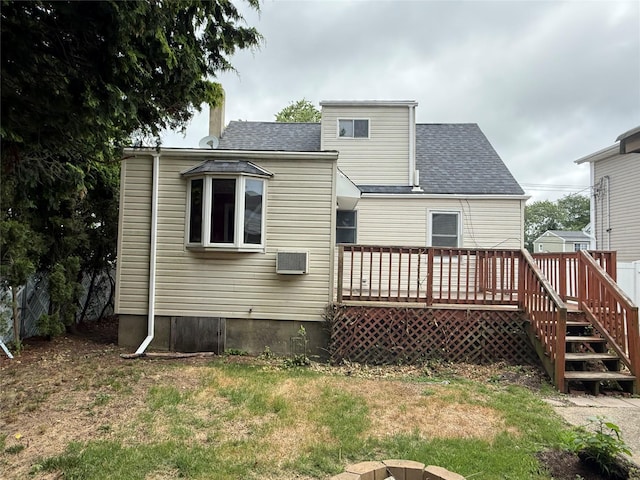 449 N Indiana Ave, Lindenhurst, NY 11757 - rear view of house featuring a wooden deck, roof with shingles, and a yard