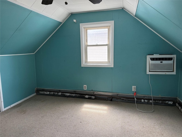 449 N Indiana Ave, Lindenhurst, NY 11757 - additional living space with vaulted ceiling, a wall mounted AC, and carpet floors