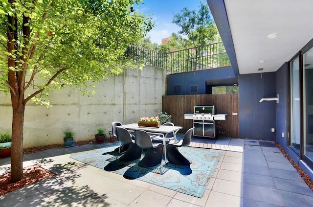 180 Woodpoint Rd Unit 1R, Brooklyn, NY 11211 - view of patio / terrace featuring outdoor dining space and a grill