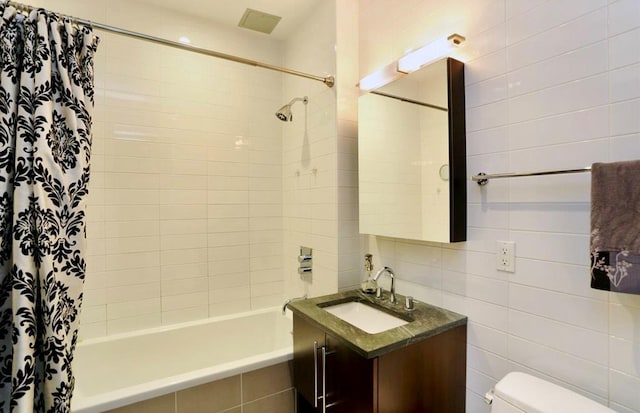 180 Woodpoint Rd Unit 1R, Brooklyn, NY 11211 - full bathroom with tiled shower / bath combo, vanity, and tile walls