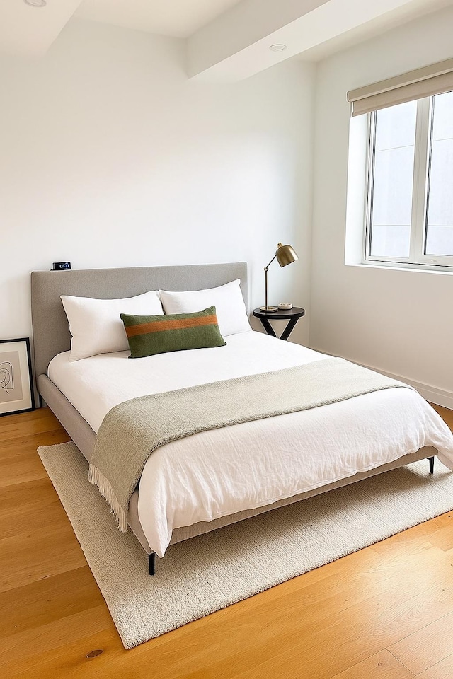 24-16 Queens Plz S Unit 4J, Long Island City, NY 11101 - bedroom featuring light wood-style floors