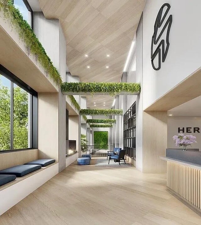 24-16 Queens Plz S Unit 4J, Long Island City, NY 11101 - common area featuring high vaulted ceiling and recessed lighting