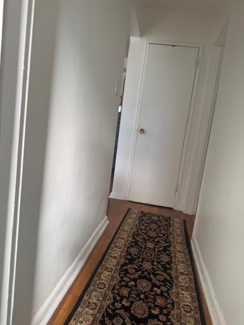 83-30 Vietor Ave Unit 716, Elmhurst, NY 11373 - hallway with wood finished floors
